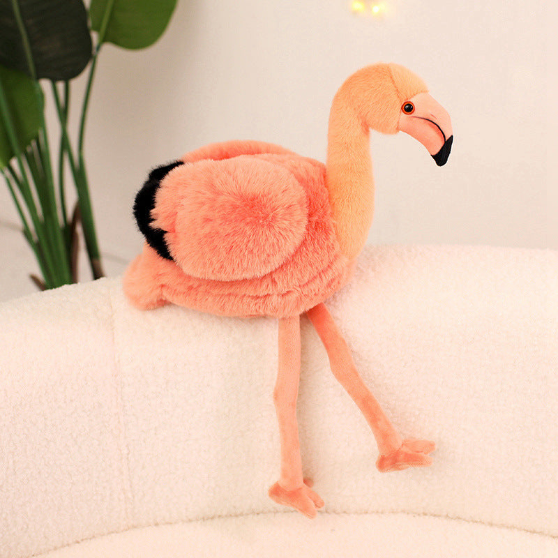 Love Flamingo Plush. A soft pink flamingo that brings warmth, romance and playful charm to any space. No Return.