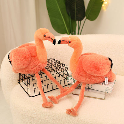 Love Flamingo Plush. A soft pink flamingo that brings warmth, romance and playful charm to any space. No Return.